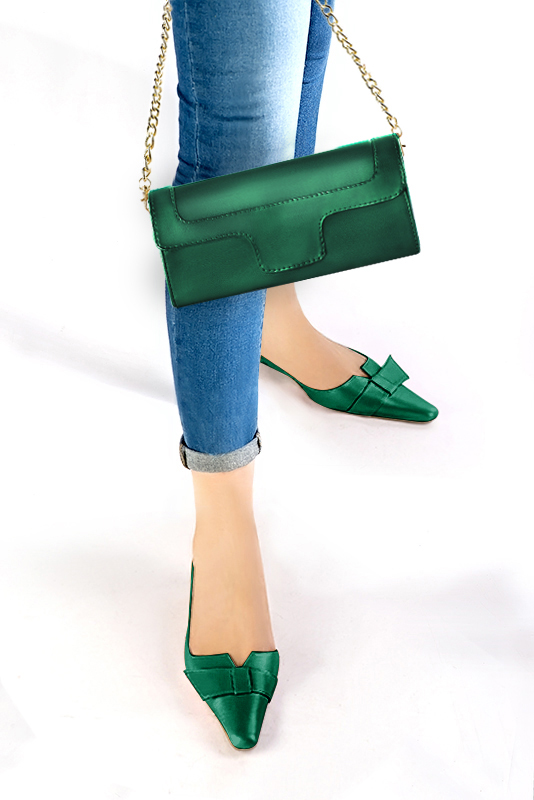 Women's emerald green luxurious elegant clutch for ceremonies, weddings and evenings out. - Worn view